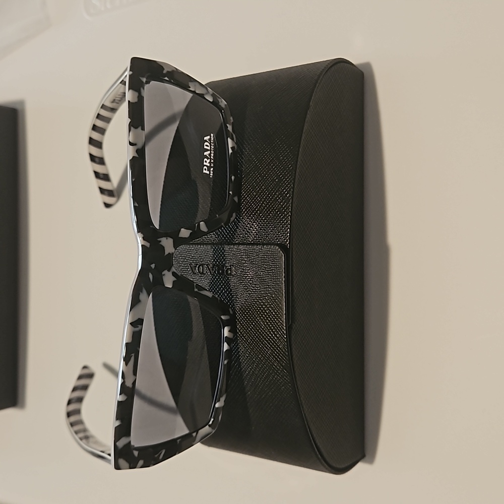 NWT Authentic Prada sunglasses with case and 2 cleaning cloth